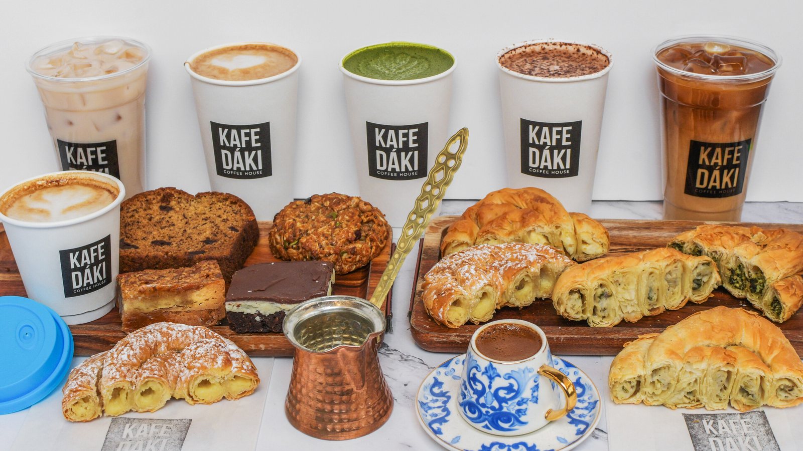 Kafe Dáki coffees, Greek pies, pastries and a Greek coffee with its copper briki